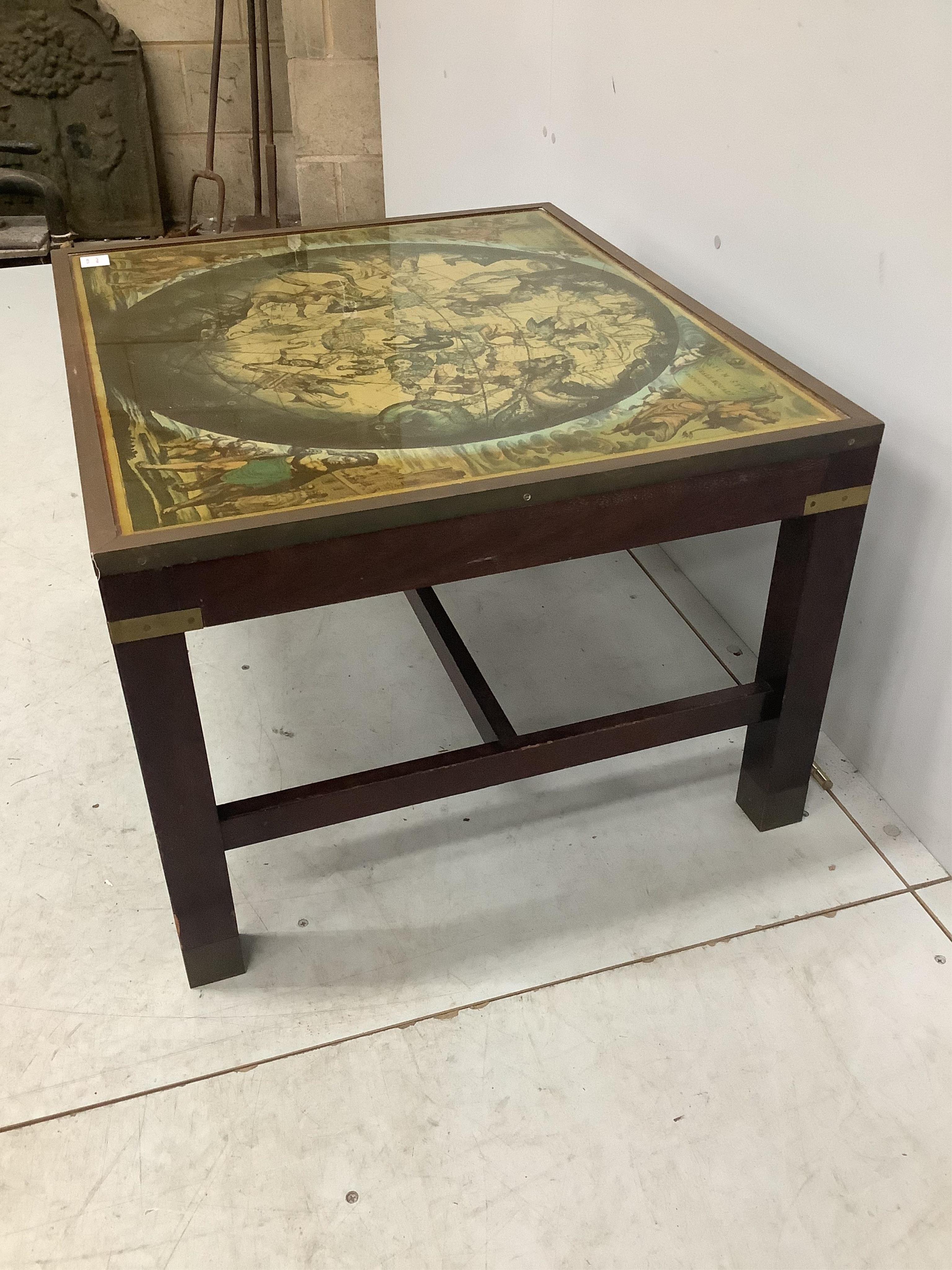 A military style brass bound mahogany coffee table, the top inset with a celestial chart, width 76cm, depth 64cm, height 46cm. Condition - fair